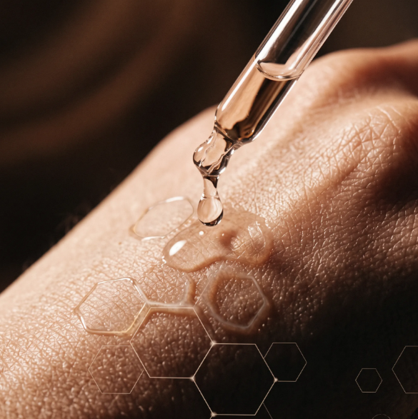 Dropper releasing Renuval formula onto skin